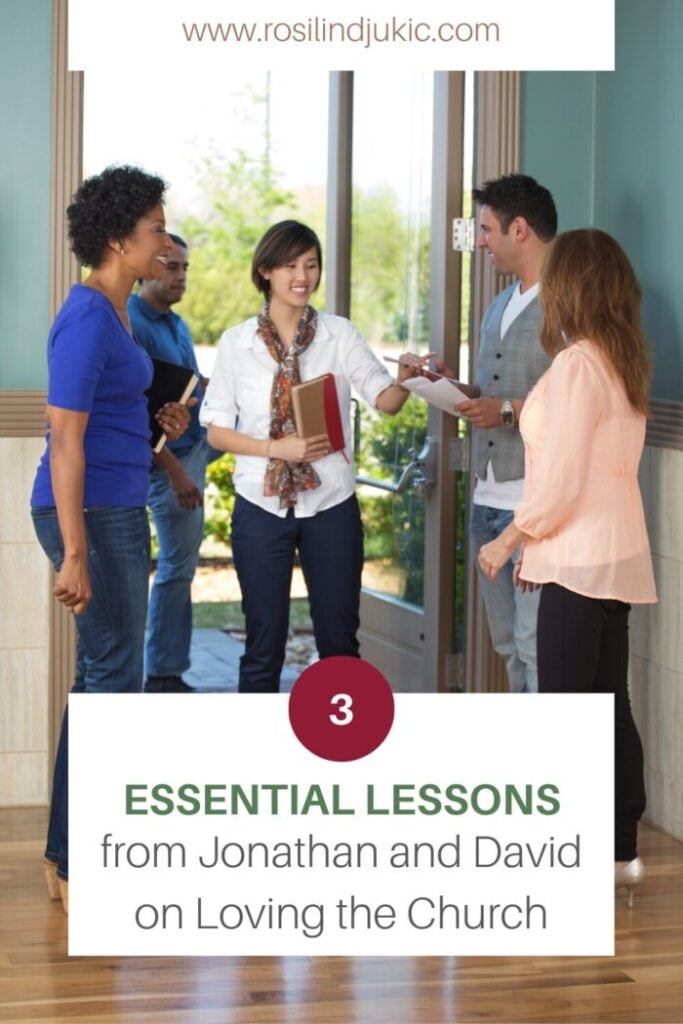 A group of people with Bibles standing at the door of a church