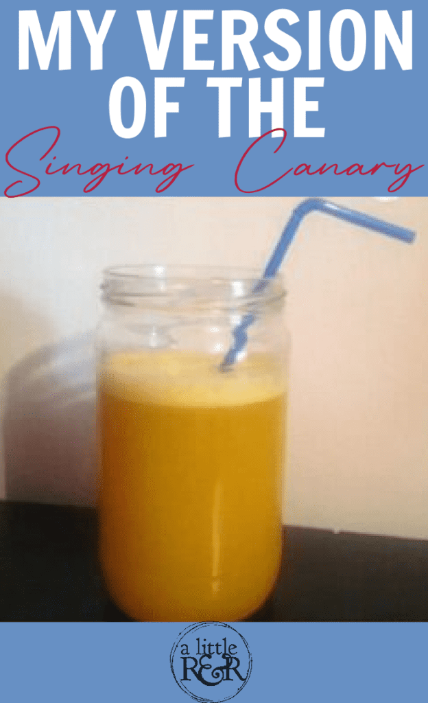 jar filled with Singing Canary drink and a blue bendable straw