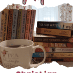A stack of Christian fiction books next to a cup of tea