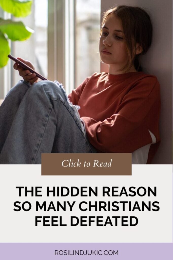 so many Christians feel defeated- a woman sadly sitting with her cell phone