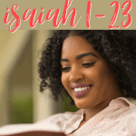 Person reading Bible and smiling