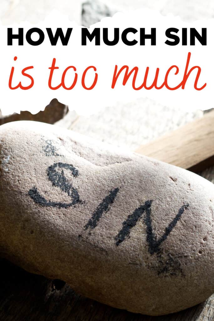 rock with the word "sin" painted on it