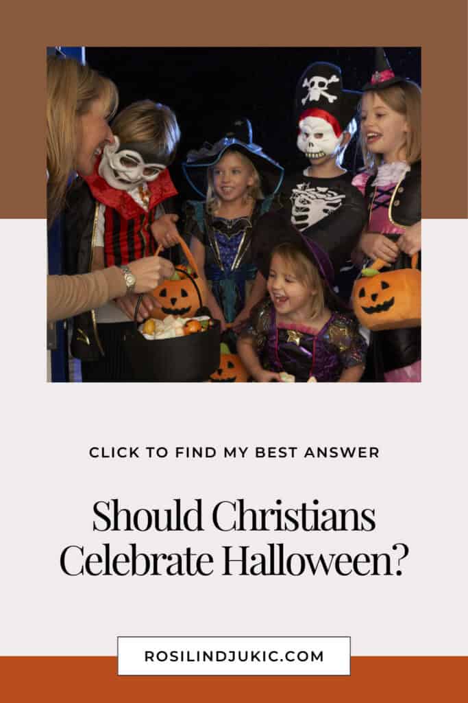 woman handing out candy to a bunch of children trick-or-treating