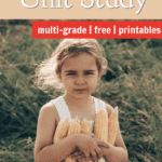 girl in field holding corn