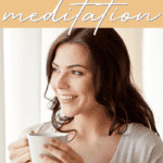 woman in white shirt holding white mug of coffee smiling