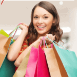 Woman carrying shopping bags of different bright colors