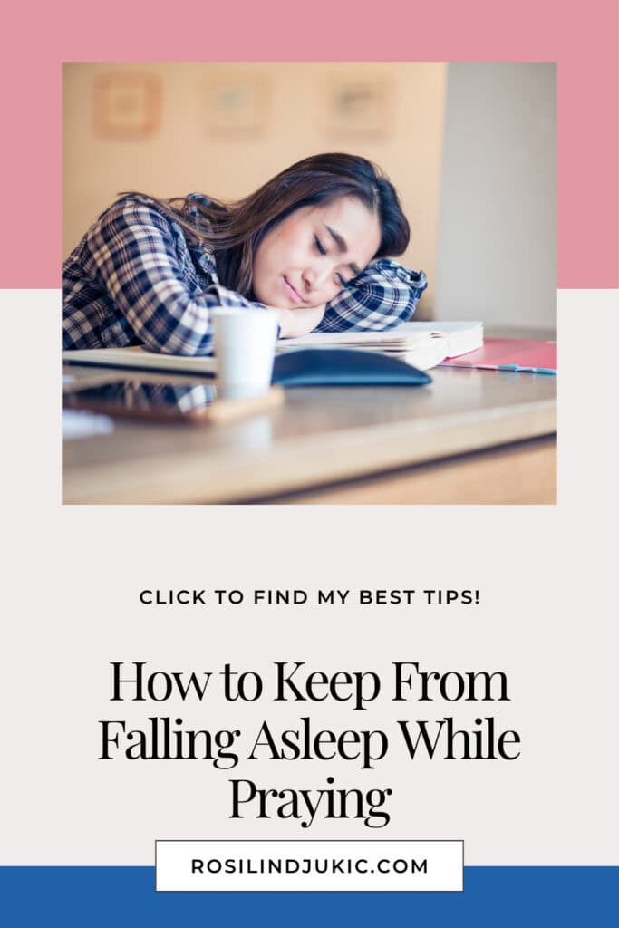 woman sleeping with head resting on a pile of books