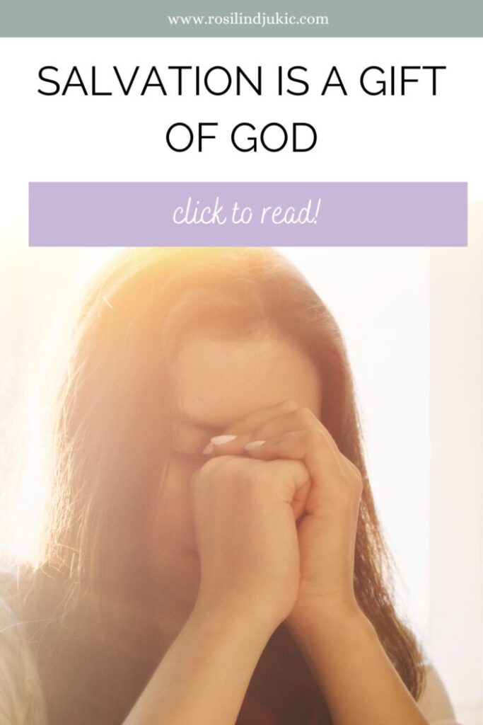 woman praying and believing that Salvation is a gift of God